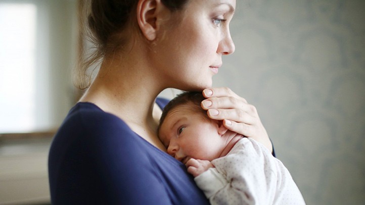 Postpartum Depression woman baby RM 722x406 - Can breastfeeding Help Prevent postpartum depression in new mothers?