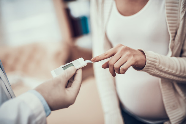 doctor is measuring blood sugar pregnant woman 94347 134 1 - Pre-diabetic can also mean blood sugar levels will normalize.