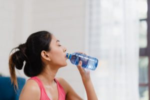 young asian woman drinking water because feel exhausted rest after exercise living room 7861 1608 300x200 - 6 Benefits of drinking water 