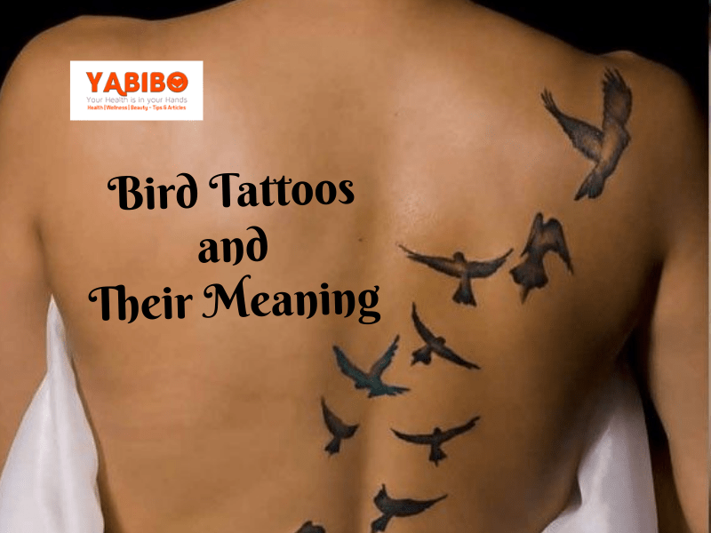 3. Delicate Bird Holding Flower Tattoo - wide 5